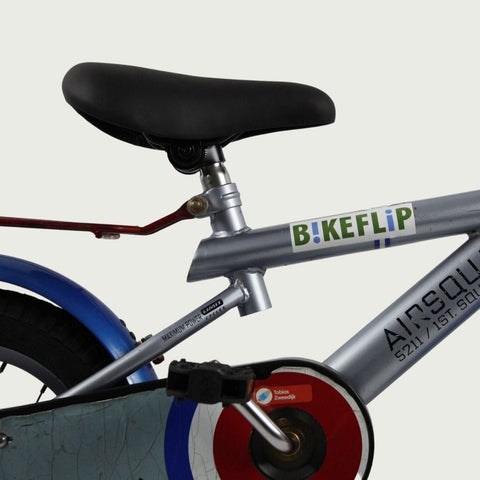 12.116 - BikeFlip, 12 inch kinderfiets, terugtraprem, handrem, kabelslot, siliconen verlichting, zilver fiets