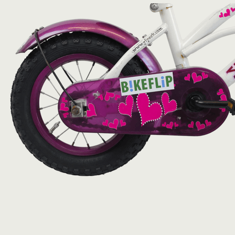 12.133 - BikeFlip, 12 inch kinderfiets, witte kinderfiets, paarse kinderfiets, hartjes fiets, handremmen, zijwieltjes