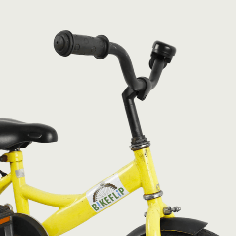 12.71 - BikeFlip, 12 inch kinderfiets, geel, terugtraprem, handrem, kabelslot, vrolijk, stoer