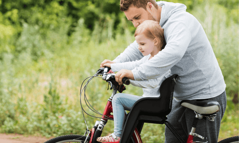 De ultieme gids voor fietszitjes: zo neem je je kindje veilig mee - BikeFlip