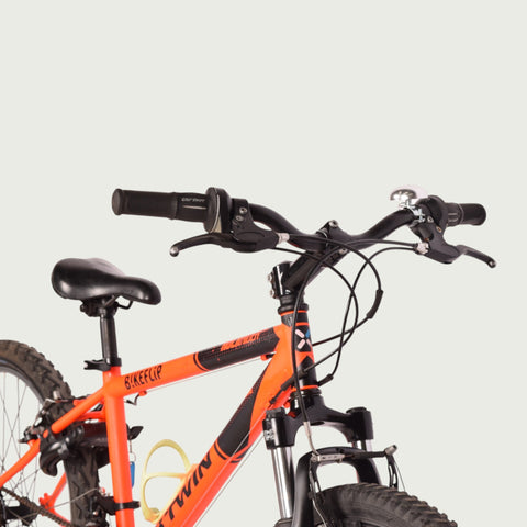 b'twin mountainbike 24 inch B-TWIN 24-inch orange children's bicycle for 9 and 10 year olds
