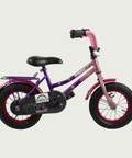 12.97 - BikeFlip, 12 inch kinderfiets, paars, terugtraprem, geen versnellingen, kabelslot, prinsessen thema, vrolijk