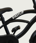 12.154 - BikeFlip, 12 inch kinderfiets, zwarte fiets, elegante fiets, terugtraprem, handrem, kabelslot, zijwieltjes