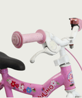 12.152 - BikeFlip, 12 inch kinderfiets, roze fiets, bloemenstickers, avontuurlijke fiets, terugtraprem, handrem, kabelslot